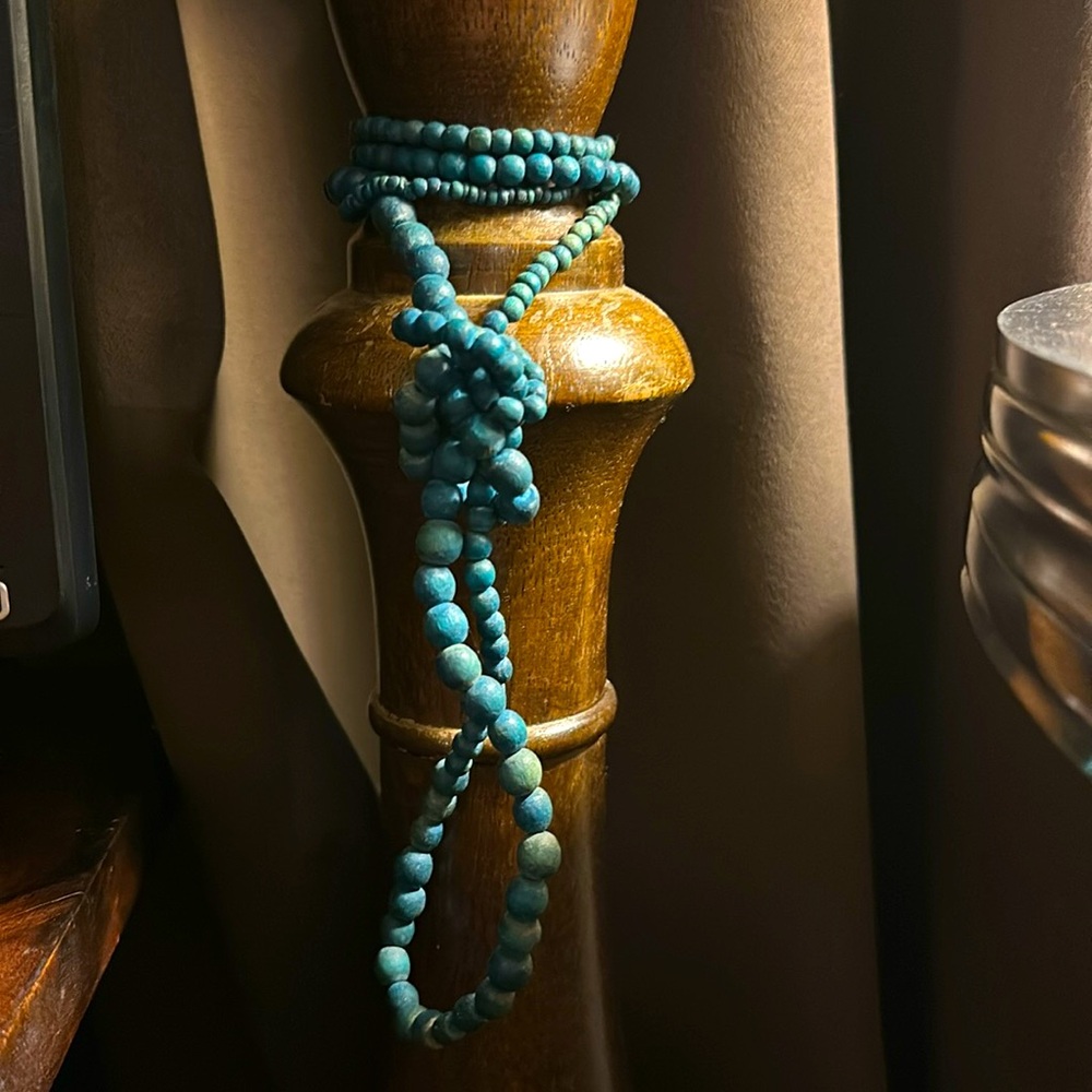 Turquoise necklace or decorative piece. Wooden beads in various sizes
